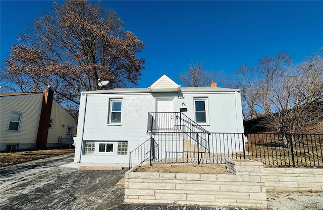 view of front of home featuring cooling unit