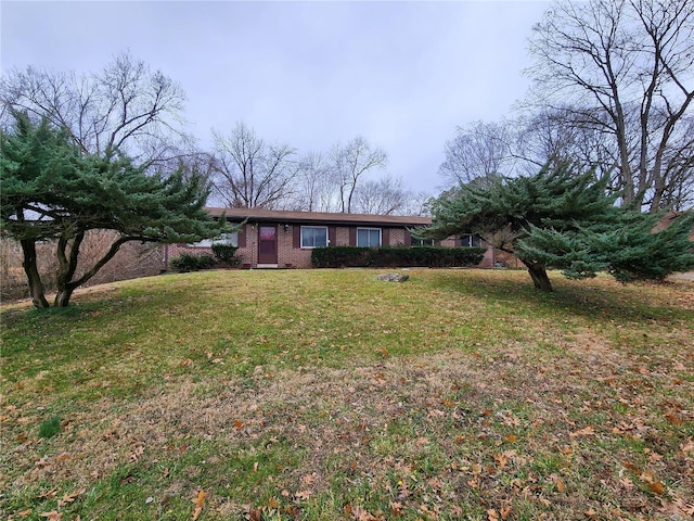 view of front of home with a front lawn