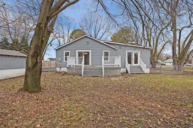 view of front of property featuring a wooden deck