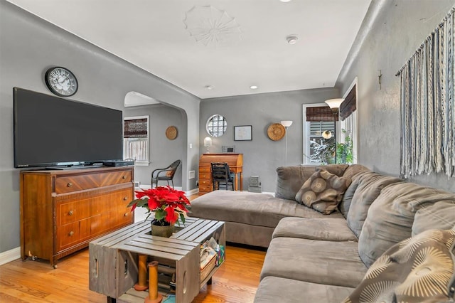 living room with light hardwood / wood-style floors