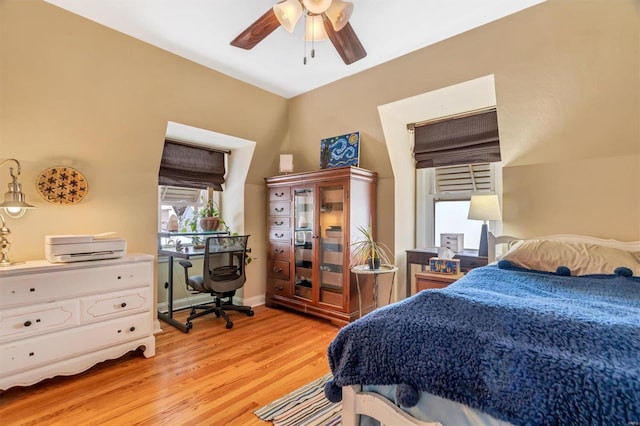 bedroom featuring ceiling fan and light hardwood / wood-style flooring