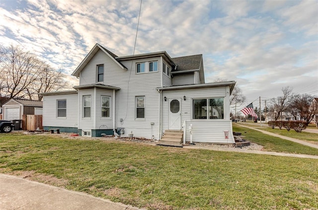 view of front facade featuring a front yard