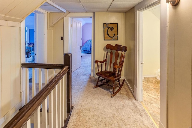 corridor with light carpet