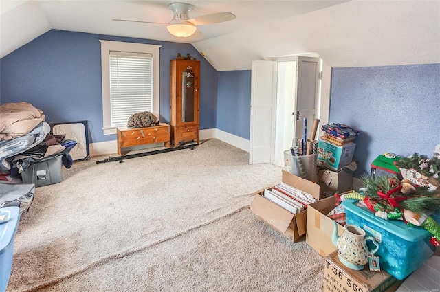 additional living space with ceiling fan, carpet floors, and lofted ceiling