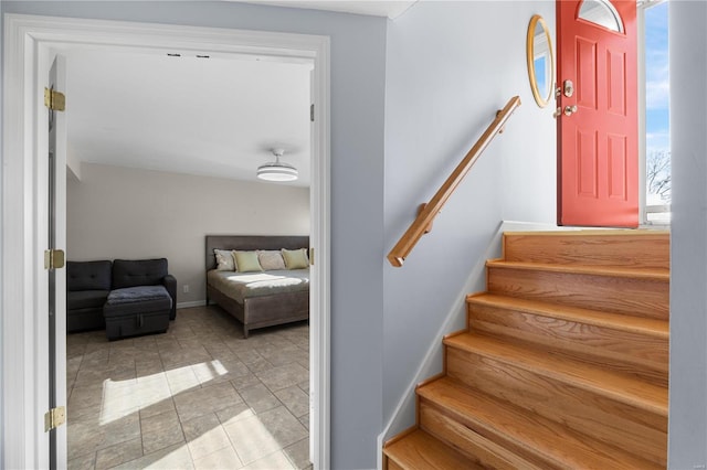 staircase featuring tile patterned flooring