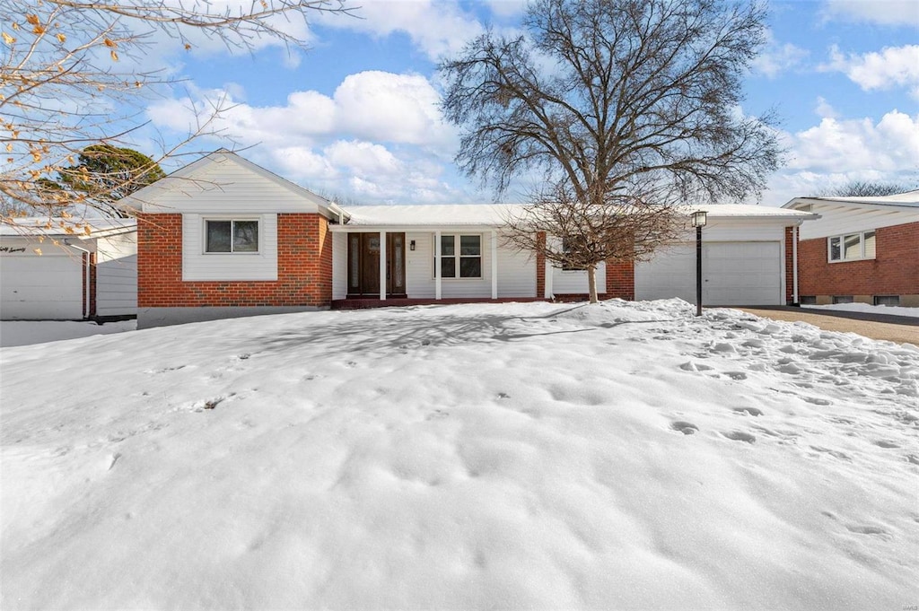 single story home with a garage