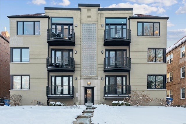 view of snow covered property