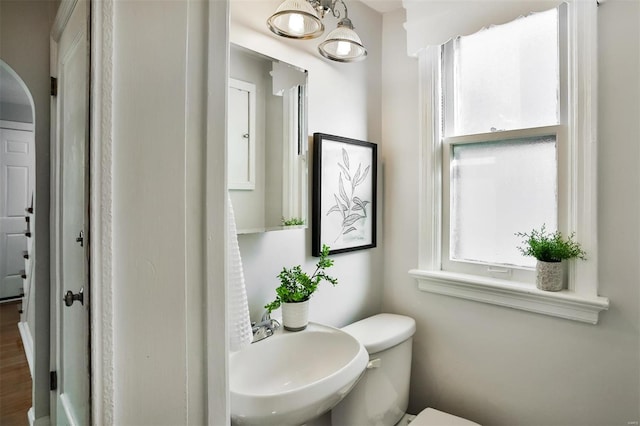 bathroom with sink and toilet