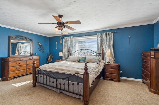 bedroom with light carpet, a textured ceiling, ceiling fan, and crown molding