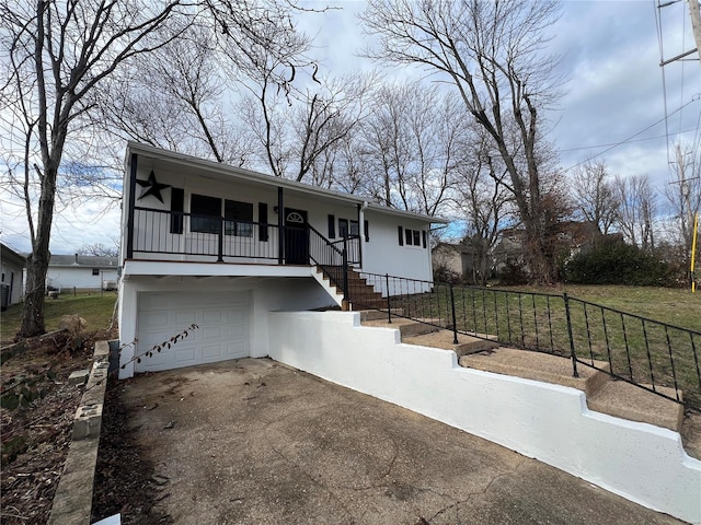 view of front of property with a garage