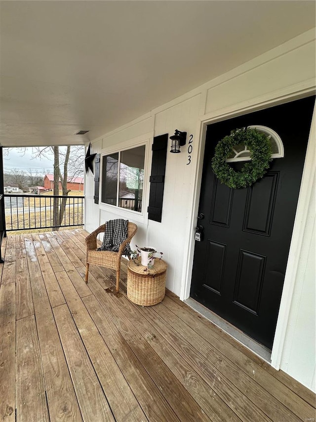 property entrance with a porch