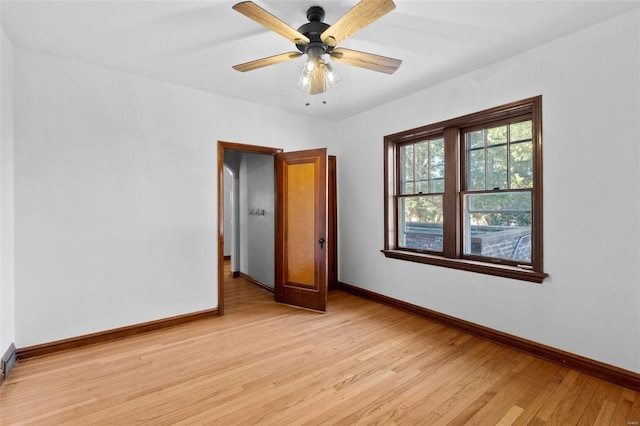 unfurnished bedroom featuring ceiling fan and light wood-type flooring