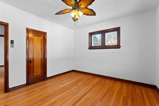 unfurnished room with ceiling fan and light wood-type flooring