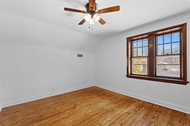 bonus room with ceiling fan, lofted ceiling, and light wood-type flooring