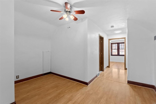 spare room featuring ceiling fan and light wood-type flooring