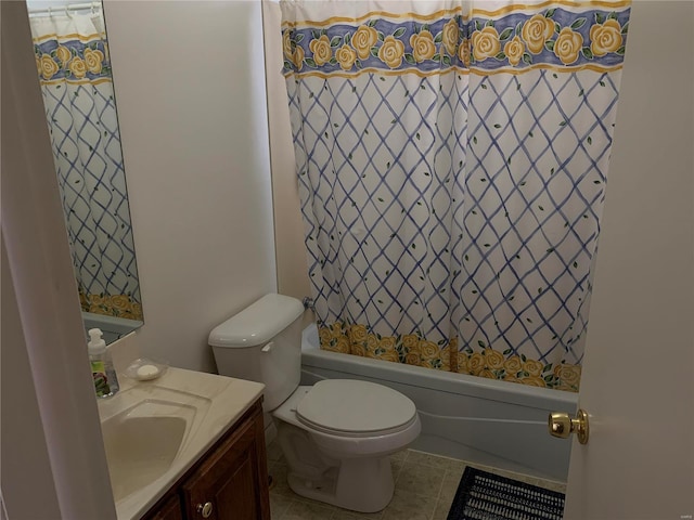 full bathroom featuring toilet, tile patterned flooring, shower / tub combo, and vanity