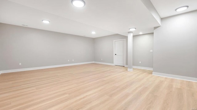 basement with light wood-type flooring