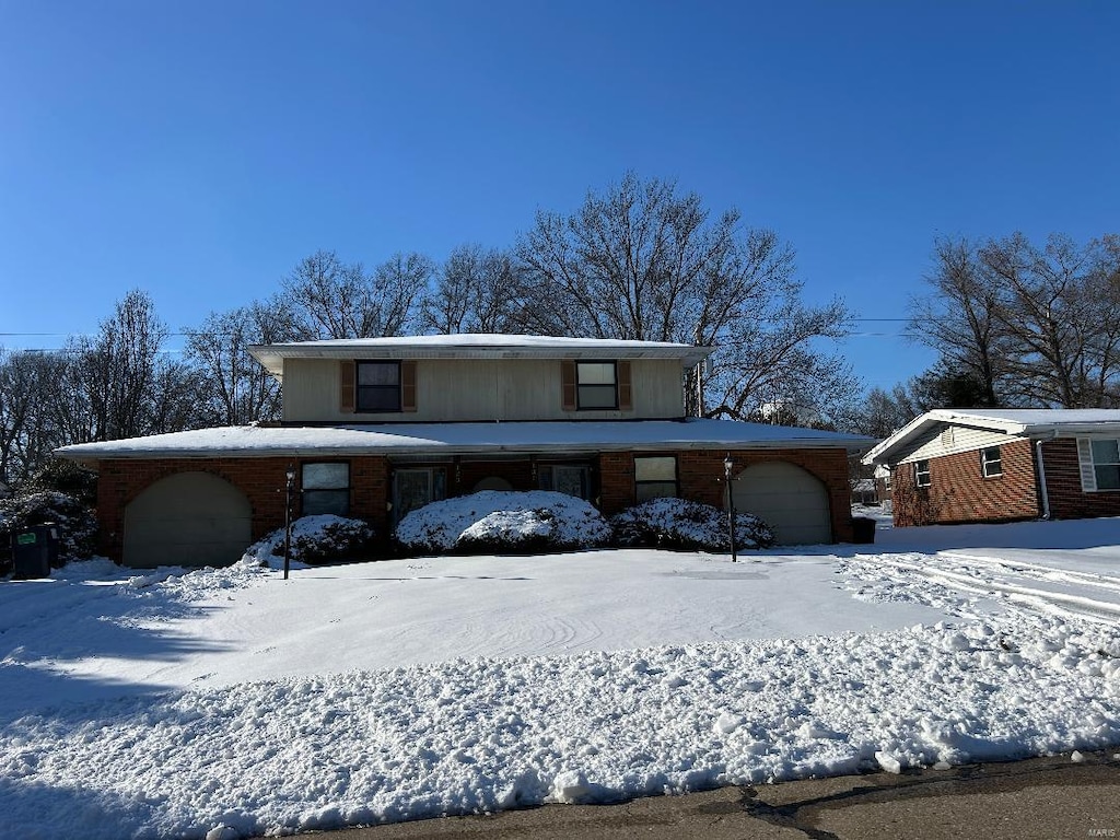 front facade with a garage