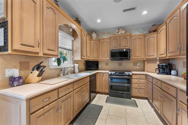 kitchen featuring backsplash, crown molding, sink, light tile patterned floors, and stainless steel appliances