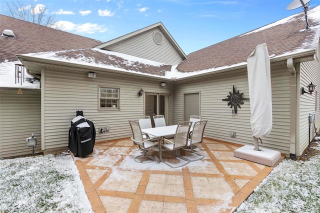 view of snow covered patio