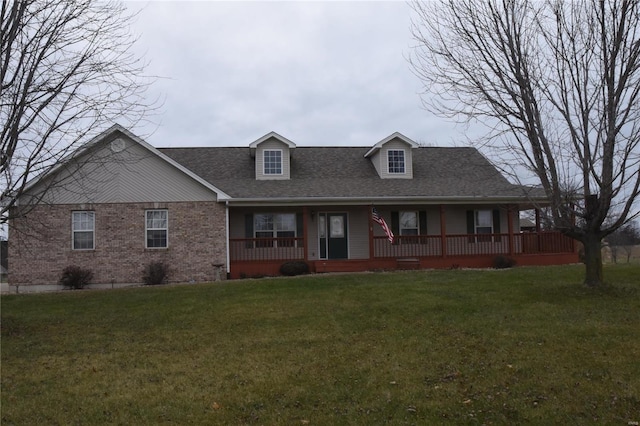 view of front of house with a front lawn and a porch