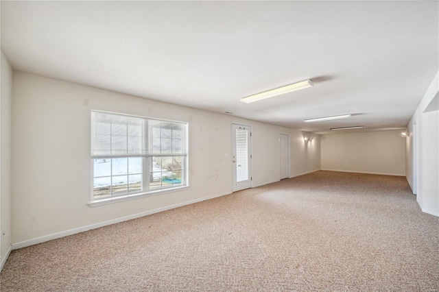 spare room featuring carpet floors