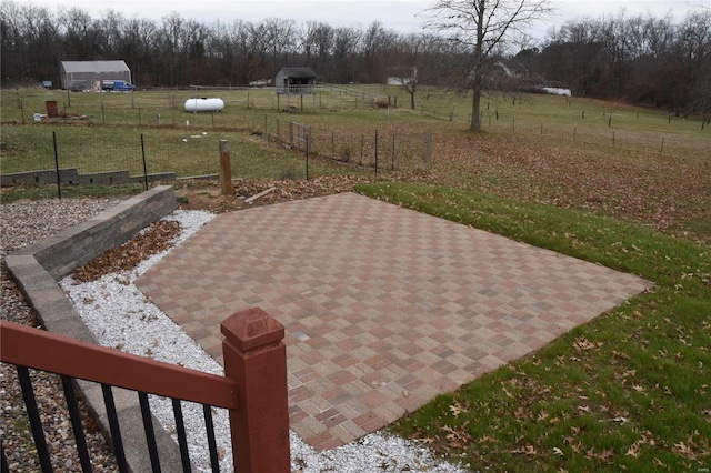 view of patio / terrace with a rural view