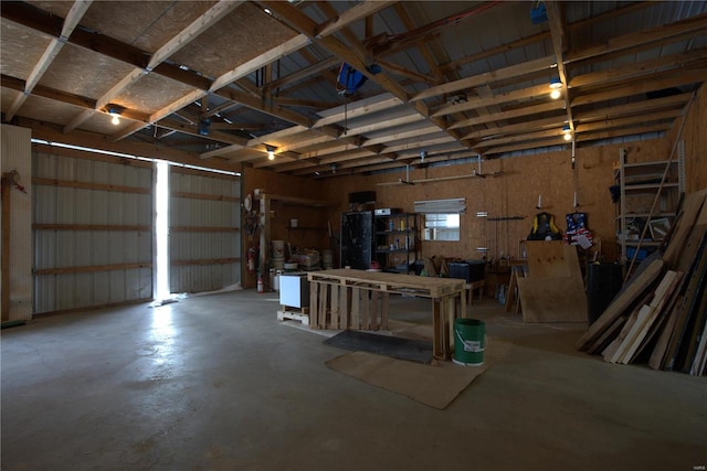 garage with a workshop area