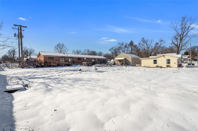 view of yard covered in snow