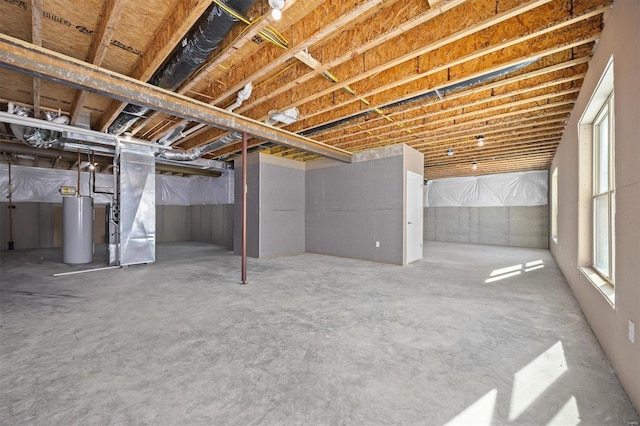 basement featuring water heater