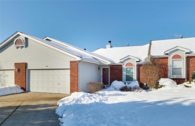 single story home with a garage