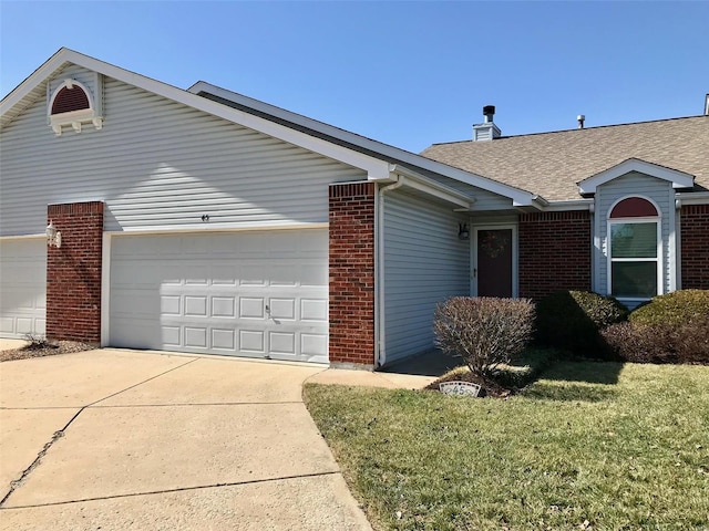 ranch-style home featuring an attached garage, brick siding, concrete driveway, roof with shingles, and a front lawn