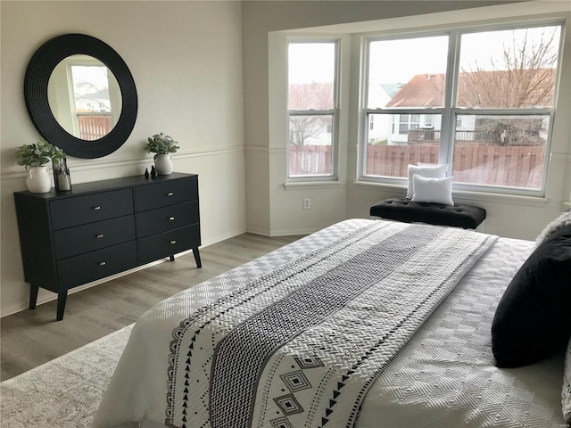 bedroom featuring light wood-type flooring