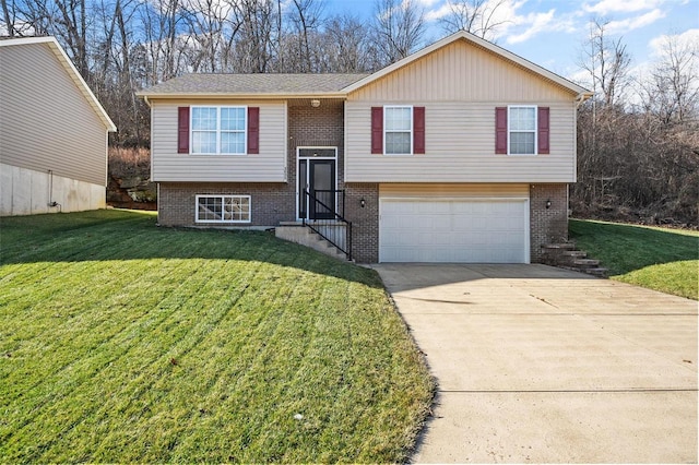 raised ranch with a garage and a front lawn