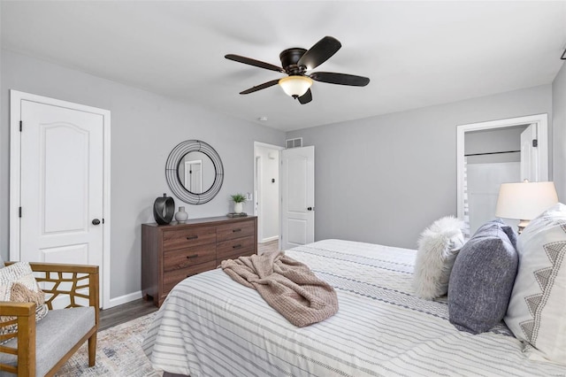 bedroom with ceiling fan and light hardwood / wood-style flooring