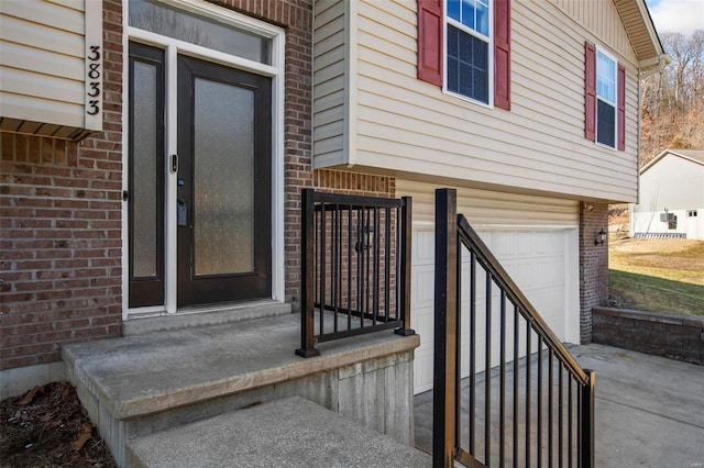 property entrance with a garage