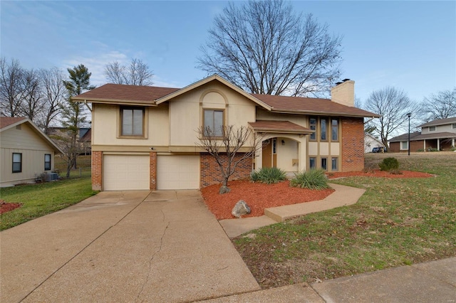 view of front of home featuring a garage, central air condition unit, and a front yard