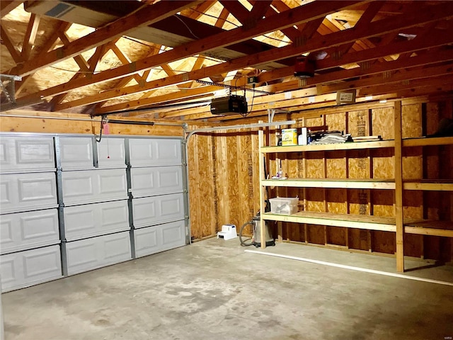 garage featuring a garage door opener