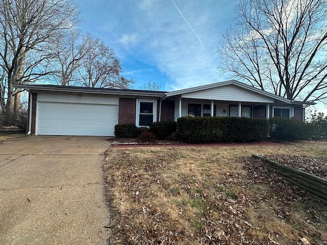 single story home featuring a garage