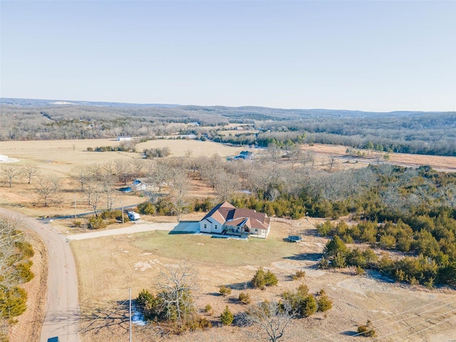 birds eye view of property featuring a rural view