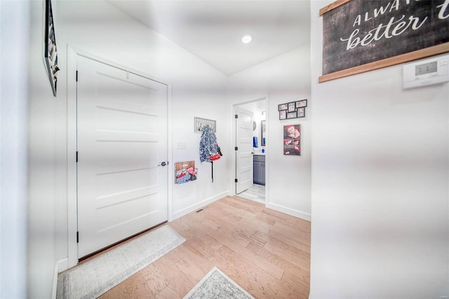 corridor featuring hardwood / wood-style flooring