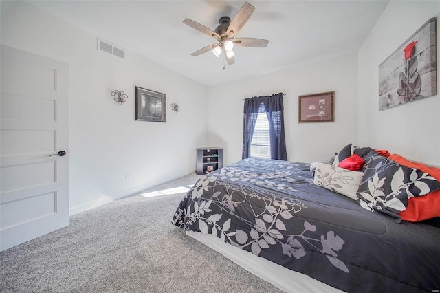 bedroom featuring ceiling fan and carpet flooring