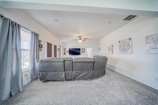 living room with carpet floors and ceiling fan