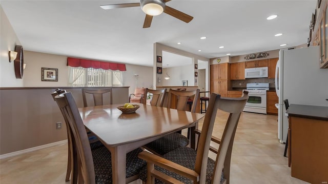 dining area featuring ceiling fan