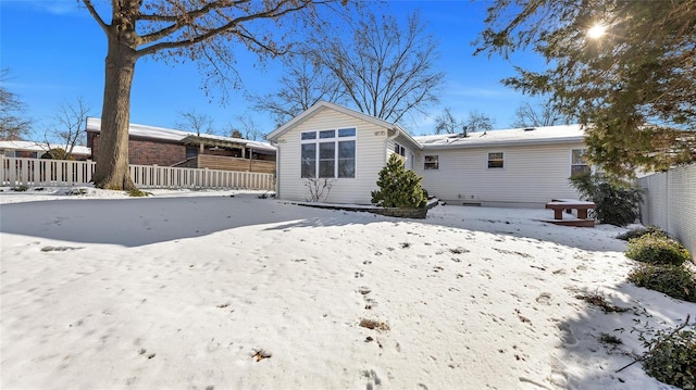 view of snow covered property