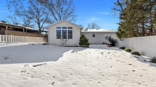 view of snow covered property