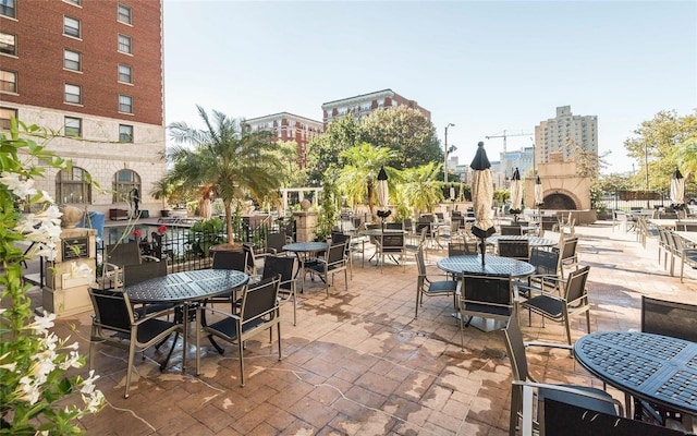 view of patio featuring exterior fireplace