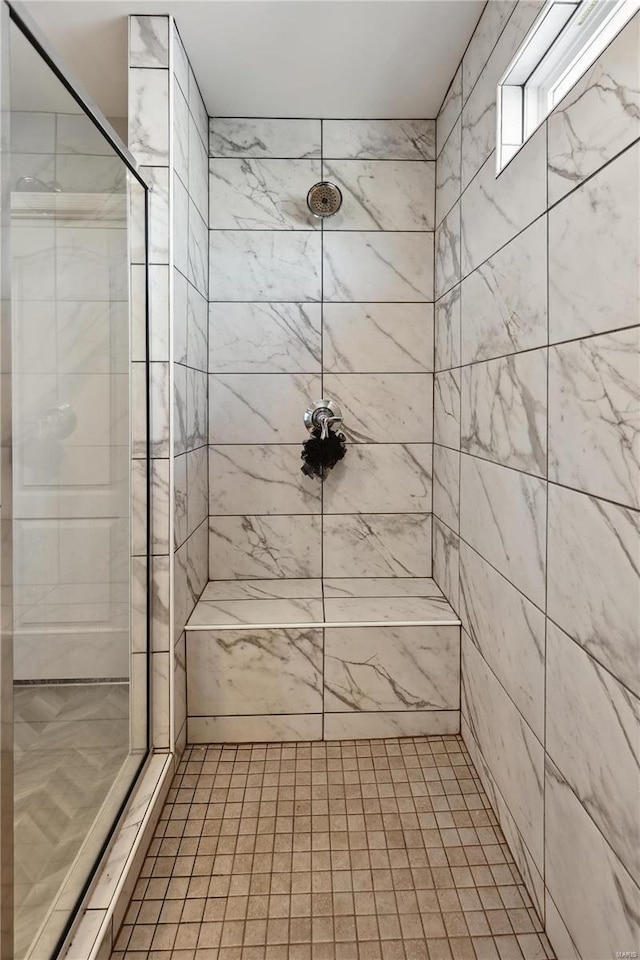 full bathroom with a stall shower