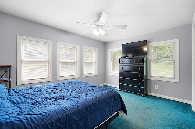 carpeted bedroom featuring ceiling fan