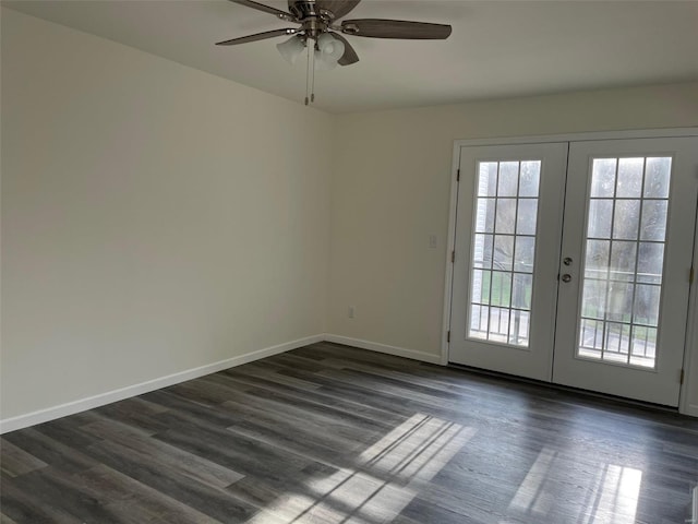 doorway with ceiling fan, dark wood-type flooring, and french doors